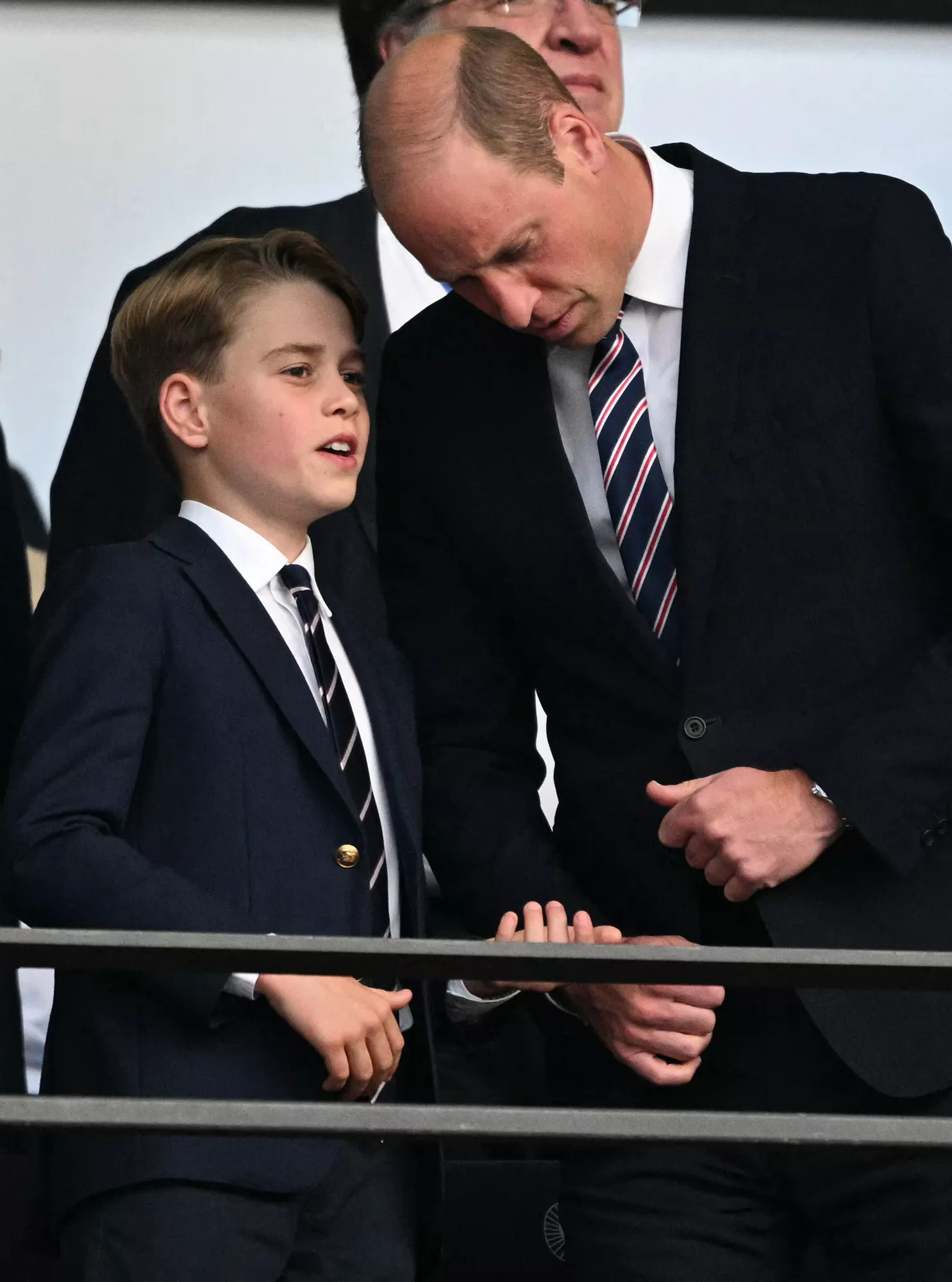 Britain's Prince William, Prince of Wales speaks with his son Britain's Prince George of Wales ahead of the UEFA Euro 2024 final football match between Spain and England at the Olympiastadion in Berlin on July 14, 2024