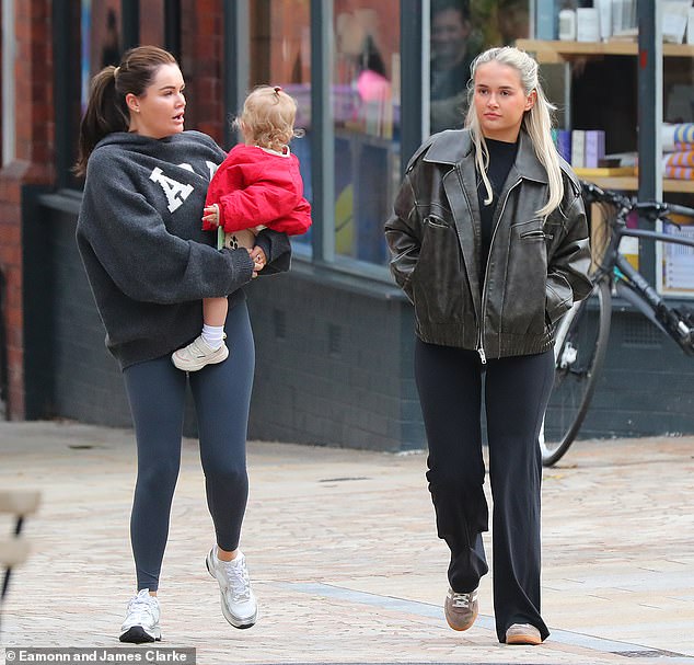 Molly-Mae Hague seemed in good spirits as she stepped out for lunch on Sunday with a friend and daughter Bambi in Altrincham after announcing her shock split from fiancé Tommy Fury