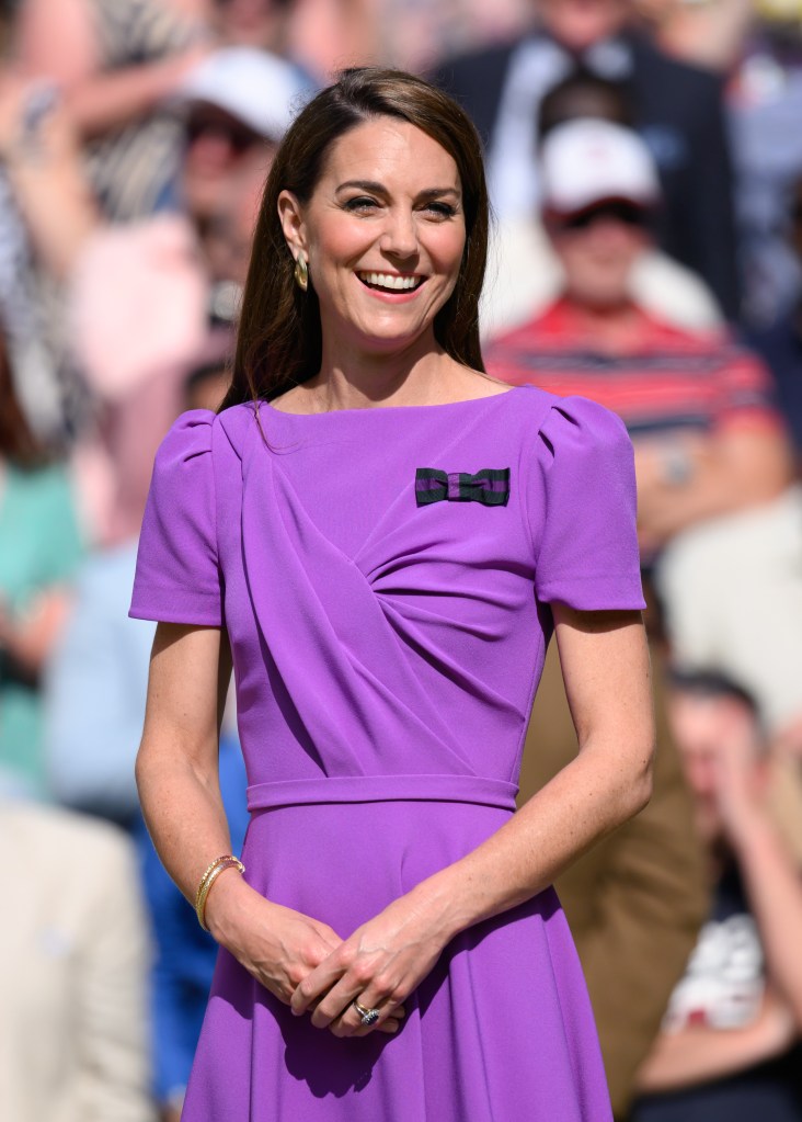 Kate Middleton on court to present the trophy to the winner of the men's final on day fourteen of the Wimbledon Tennis Championships 